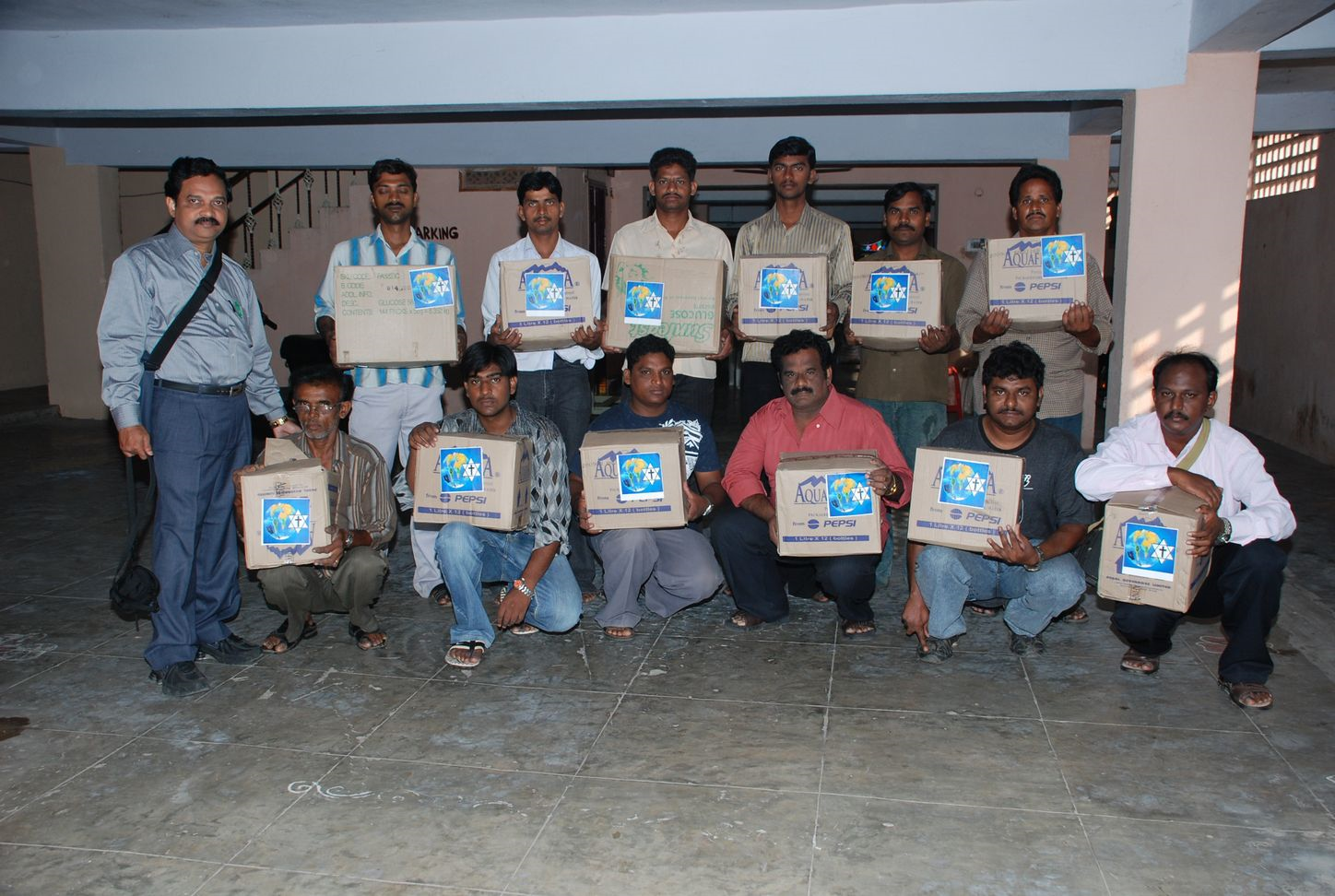 Bishop Yelchuri with volunteers ready to provide Disaster Relief